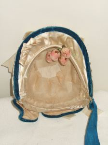 From the Timely Tresses Collection - Fanchon bonnet with covered cross-band. Notice the stitches used to attach the band that are visible on the left. 